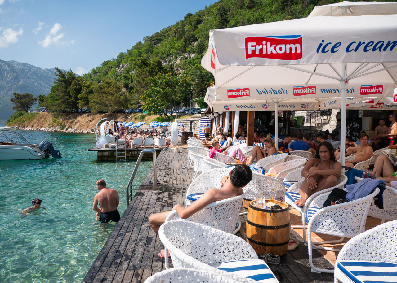 perast-pirate-bar-1280x914-1 People relaxing on the deck at Pirate Bar in Perast, Montenegro